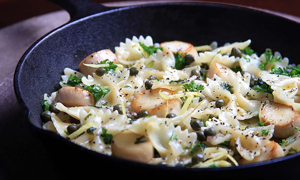 Mushroom 'scallops' with creamy white wine sauce and pasta