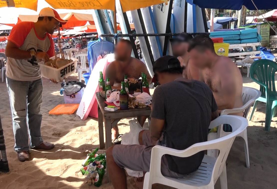 Australian tourists purchase dog meat ‘satay sticks’ on Bali’s beaches.